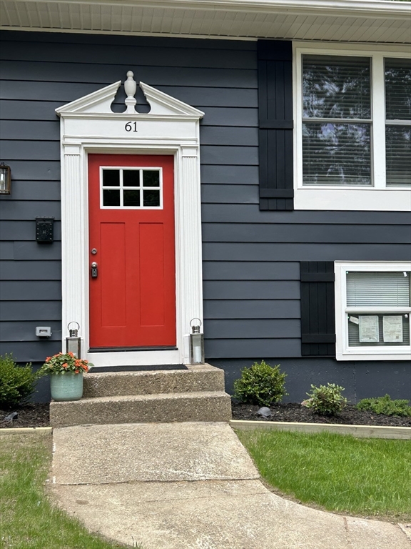 61 Esta Road Plymouth, MA 02360 - Photo 5 of 40 a front view of a house with a yard