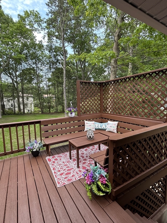 61 Esta Road Plymouth, MA 02360 - Photo 8 of 40 a view of a wooden bench on the roof deck