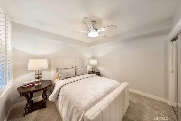 a bed room with a bed and a table