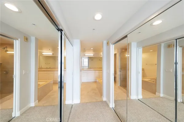 a view of a bathroom with a glass shower door