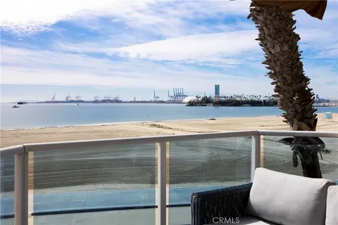 a view of swimming pool with outdoor seating
