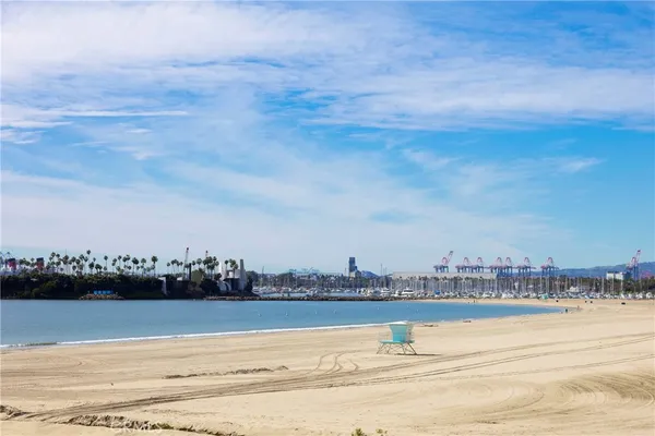 a view of a livingroom with furniture and a window