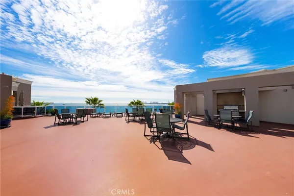 a view of a patio with swimming pool