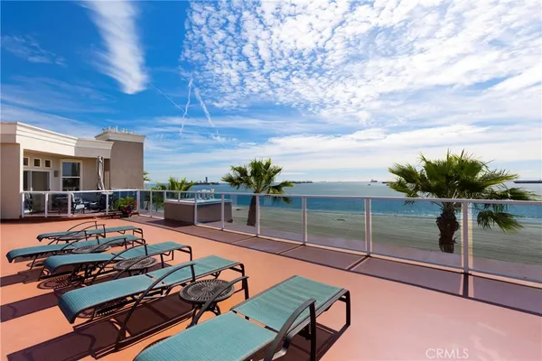 a front view of a building with many windows