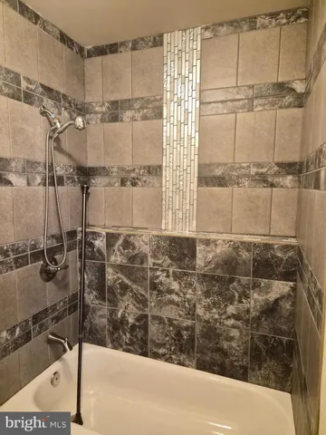 a bathroom with a bathtub