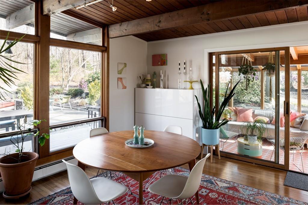 25 Rockwood Road Hingham, MA 02043 - Photo 11 of 34 a view of a dining room with furniture window and wooden floor