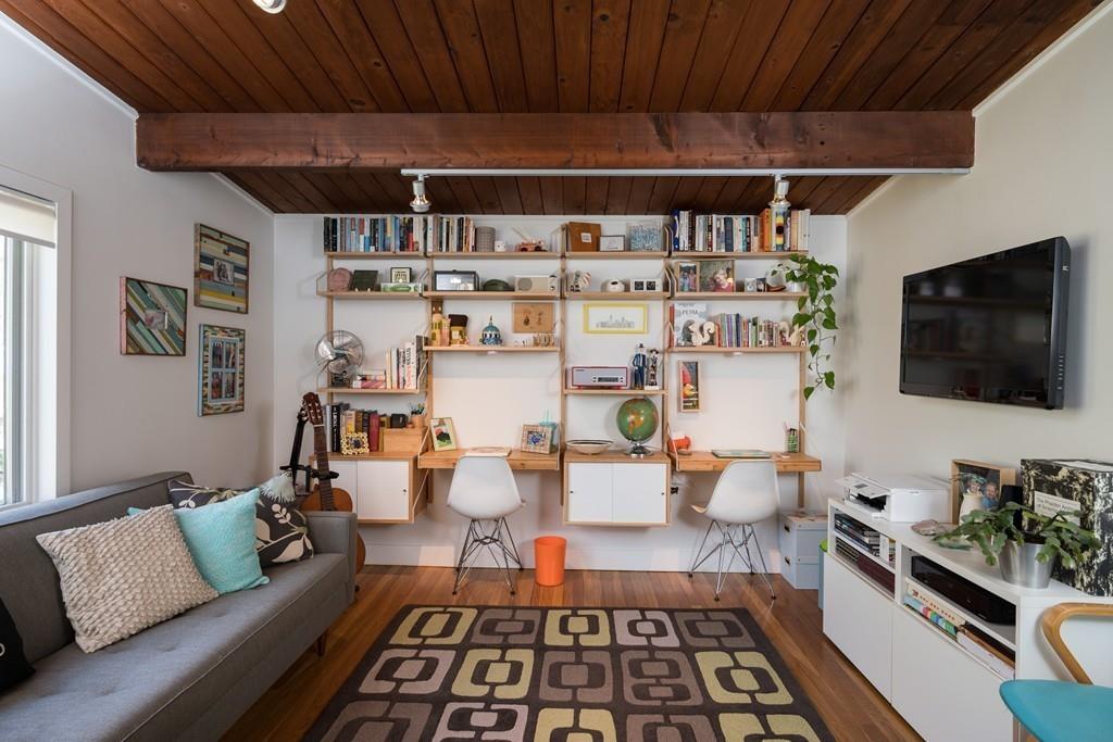 25 Rockwood Road Hingham, MA 02043 - Photo 20 of 34 a living room with furniture and a flat screen tv
