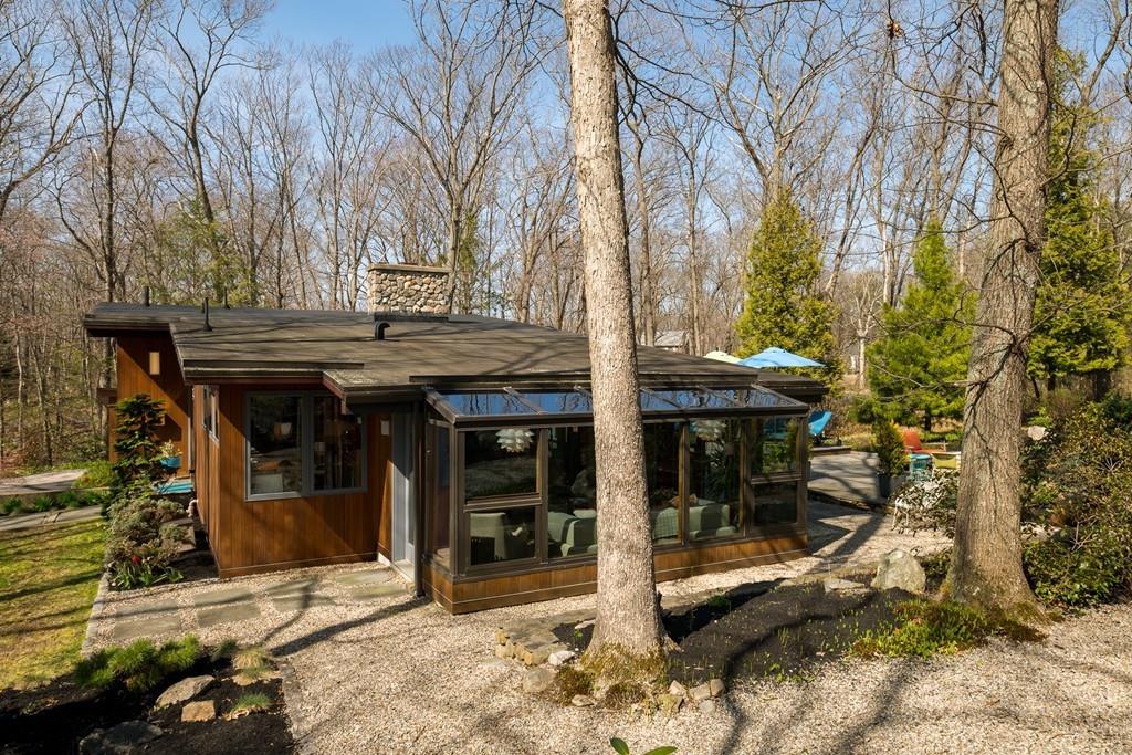 25 Rockwood Road Hingham, MA 02043 - Photo 30 of 34 a view of a bedroom with a tree in the patio