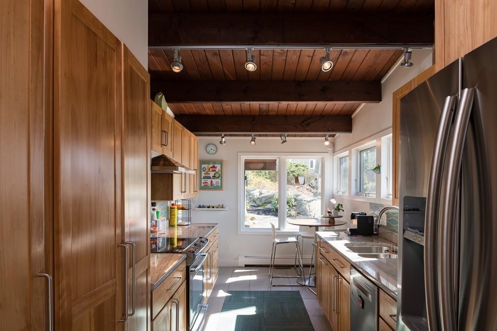 25 Rockwood Road Hingham, MA 02043 - Photo 4 of 34 a kitchen with stainless steel appliances a refrigerator and a stove