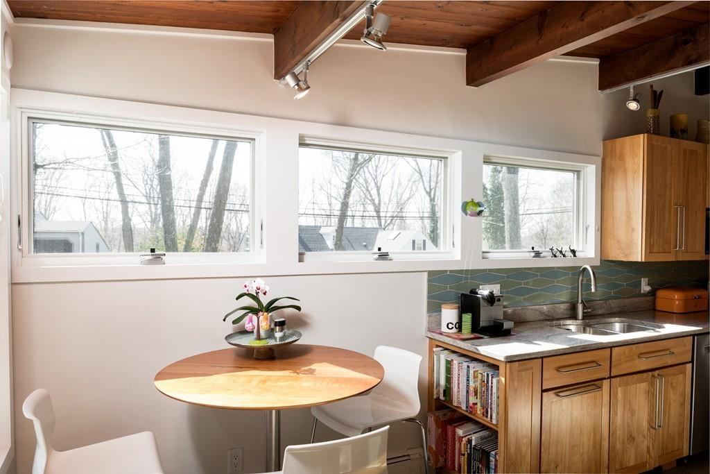 25 Rockwood Road Hingham, MA 02043 - Photo 7 of 34 a kitchen with a stove a sink and a refrigerator