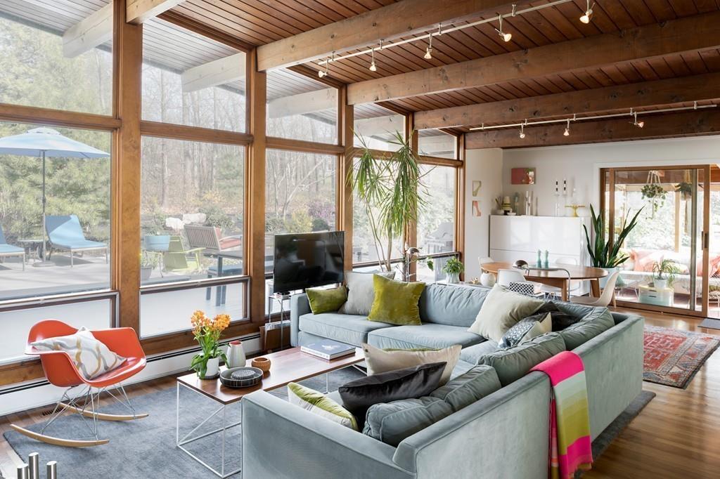 25 Rockwood Road Hingham, MA 02043 - Photo 8 of 34 a living room with furniture and a floor to ceiling window