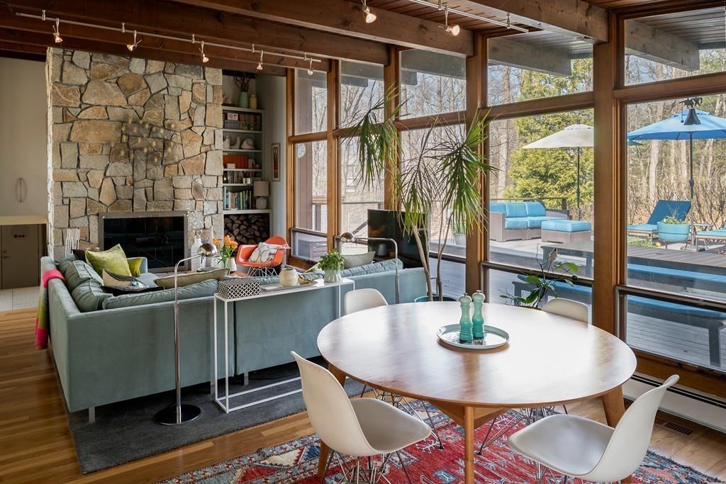 25 Rockwood Road Hingham, MA 02043 - Photo 9 of 34 a dining room with a table and chairs
