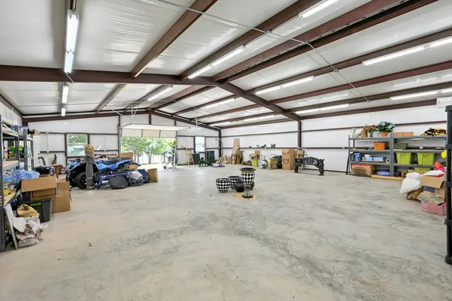 a view of parking garage with cars