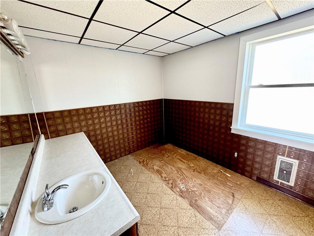 138 Church Street Hopwood, PA 15445 - Photo 16 of 29 a bedroom with a bed and a window
