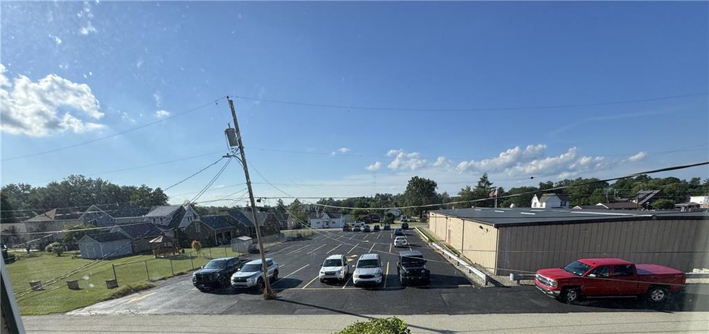 138 Church Street Hopwood, PA 15445 - Photo 20 of 29 a view of a city street with cars