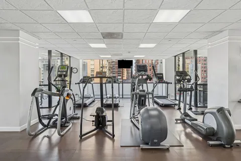 a view of a room with gym equipment