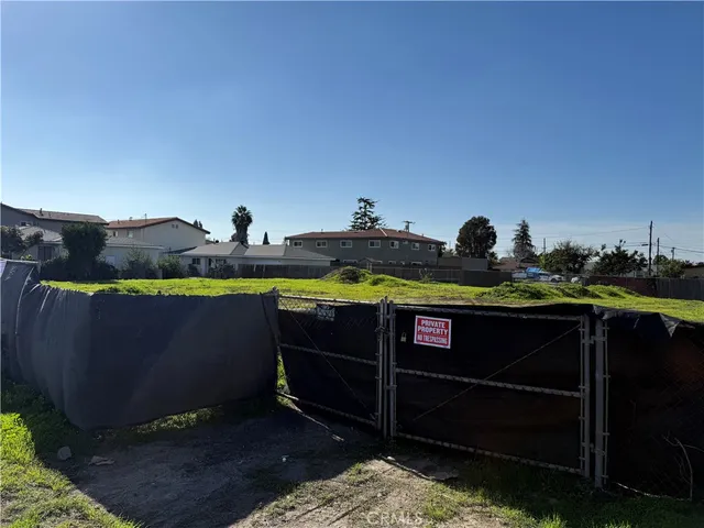a view of swimming pool with outdoor seating and yard