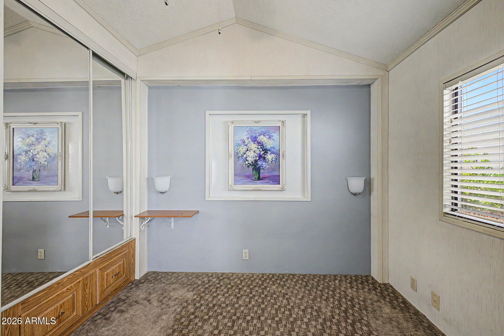 7750 East Broadway Road, Unit 560 Mesa, AZ 85208 - Photo 9 of 18 an empty room with windows