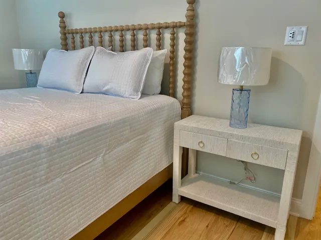 a bathroom with a sink a toilet and a shower