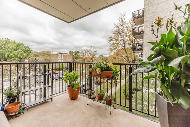 a view of a balcony with city view