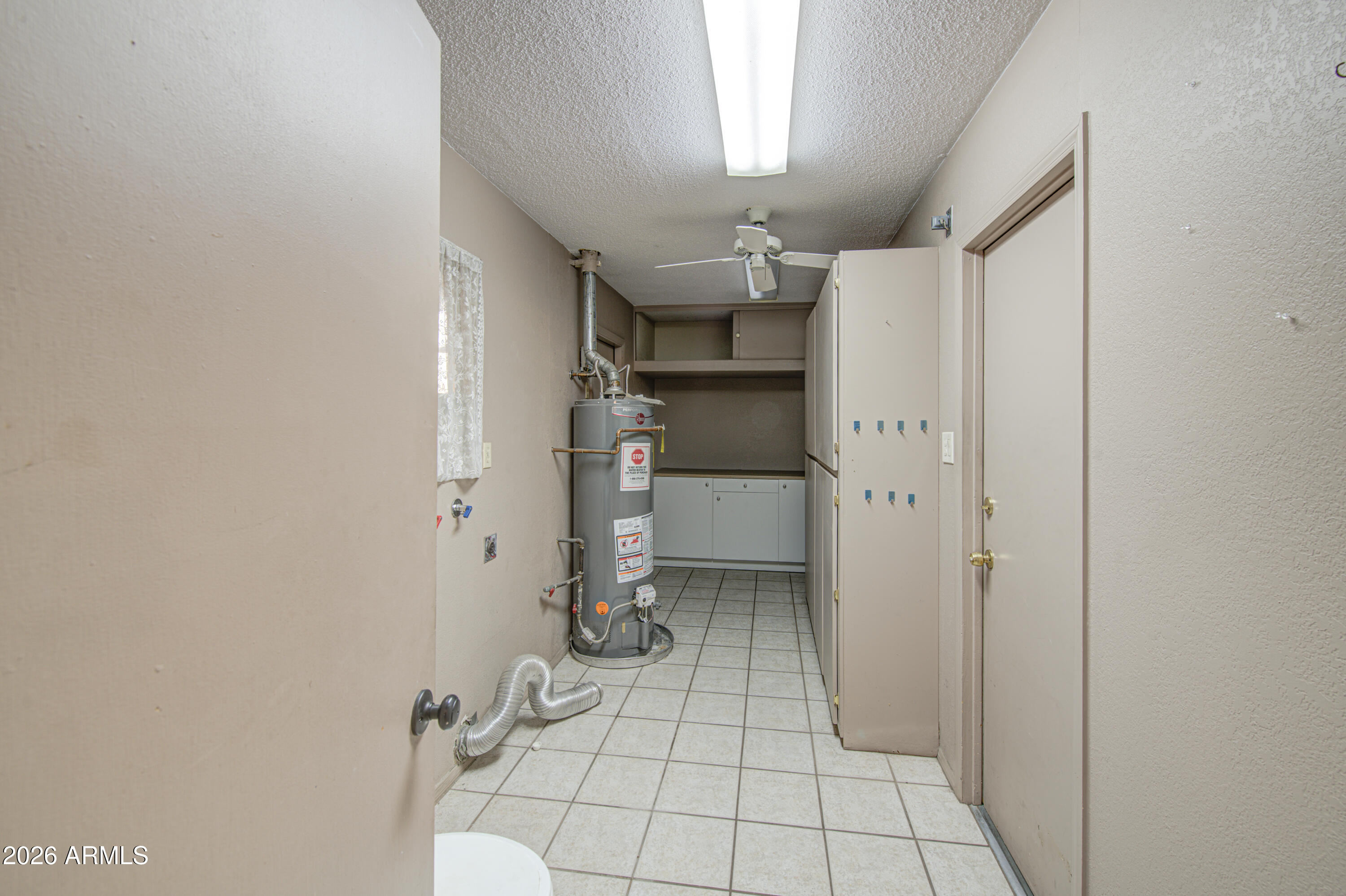 3501 West Royal Palm Road Phoenix, AZ 85051 - Photo 27 of 36 Laundry-Half Bath 1