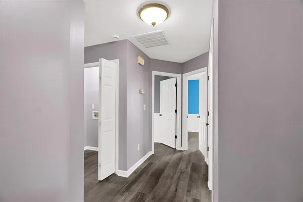 a view of livingroom with furniture and wooden floor