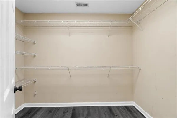 a view of a room with racks on the wall