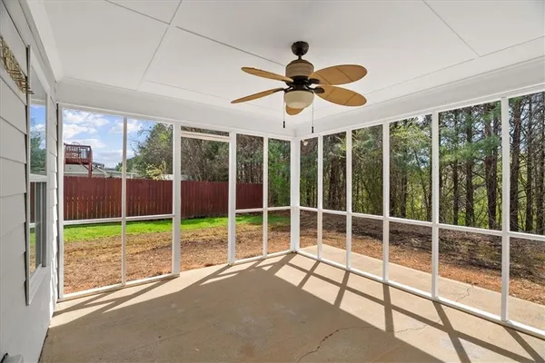 a view of a room with a large window