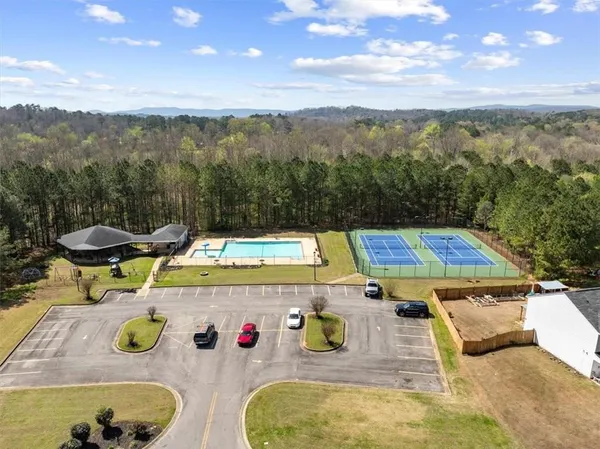 a view of a swimming pool with mountain view