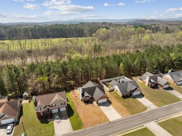 a view of a lake with couches