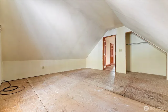 a view of a utility room with stairs