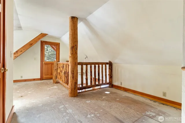 a view of staircase with large trees