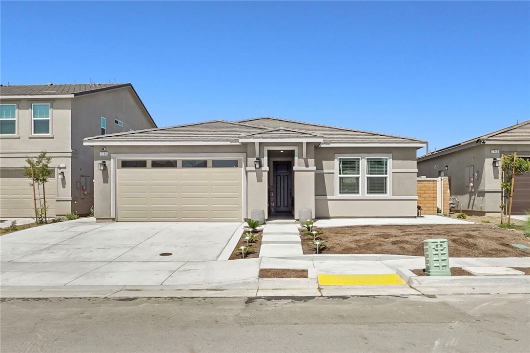 a house with a swimming pool in front of it