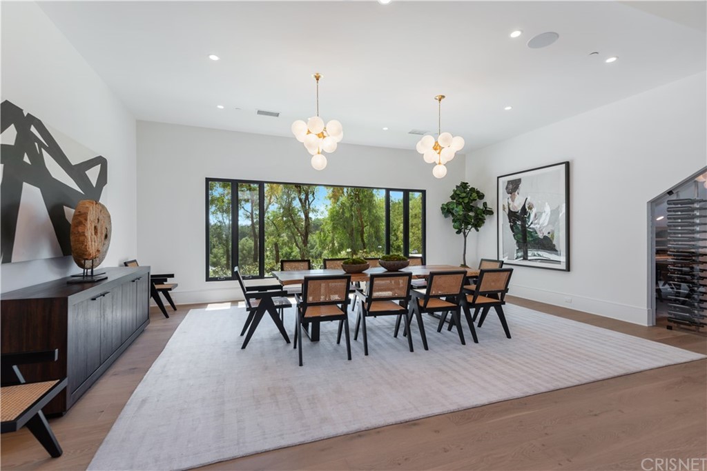 5757 Hoback Glen Road Hidden Hills, CA 91302 - Photo 11 of 47 a view of a dining room with furniture window and outside view