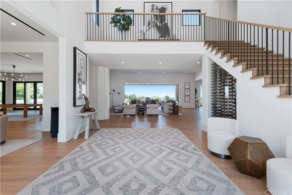 5757 Hoback Glen Road Hidden Hills, CA 91302 - Photo 2 of 47 a view of a living room and dining room