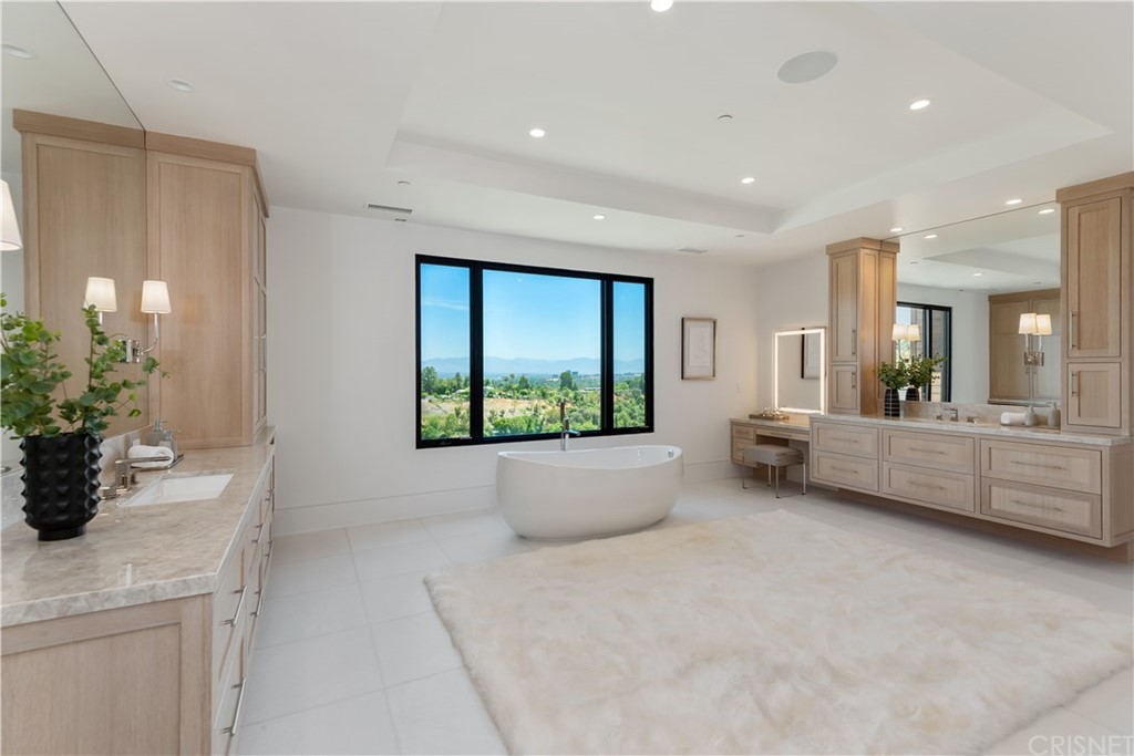 5757 Hoback Glen Road Hidden Hills, CA 91302 - Photo 23 of 47 a view of a room with furniture and a potted plant