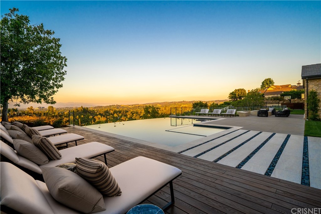 5757 Hoback Glen Road Hidden Hills, CA 91302 - Photo 42 of 47 a view of a terrace with seating space