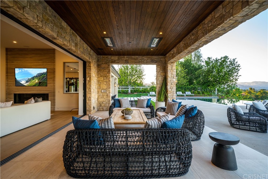 5757 Hoback Glen Road Hidden Hills, CA 91302 - Photo 43 of 47 a outdoor living space with furniture and garden view