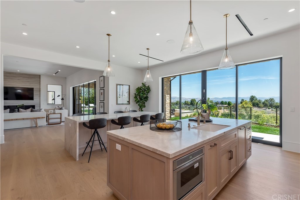 5757 Hoback Glen Road Hidden Hills, CA 91302 - Photo 6 of 47 a view of living room with furniture and flat screen tv