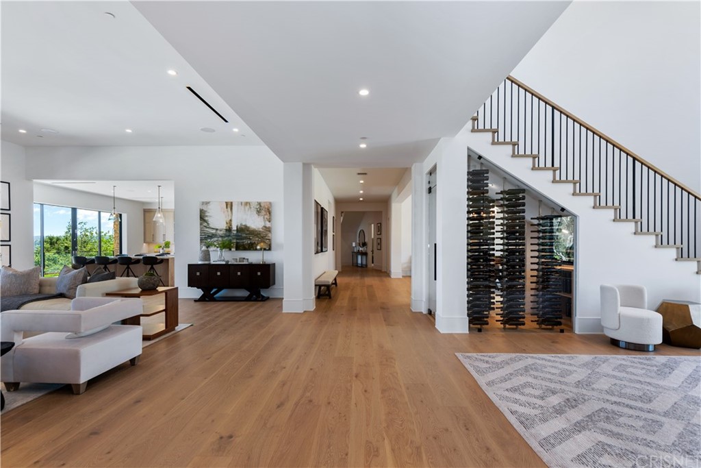 5757 Hoback Glen Road Hidden Hills, CA 91302 - Photo 10 of 47 a view of a living room and entryway in a hall