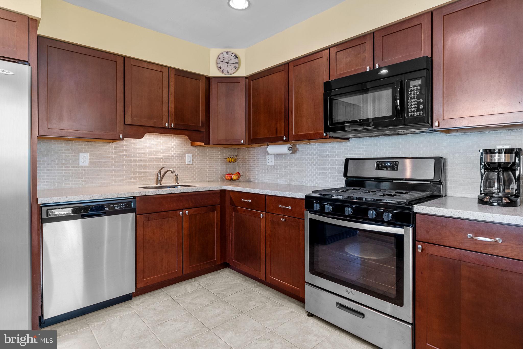1317 Whitney Road Southampton, PA 18966 - Photo 11 of 28 Stainless appliances and rich cabinetry