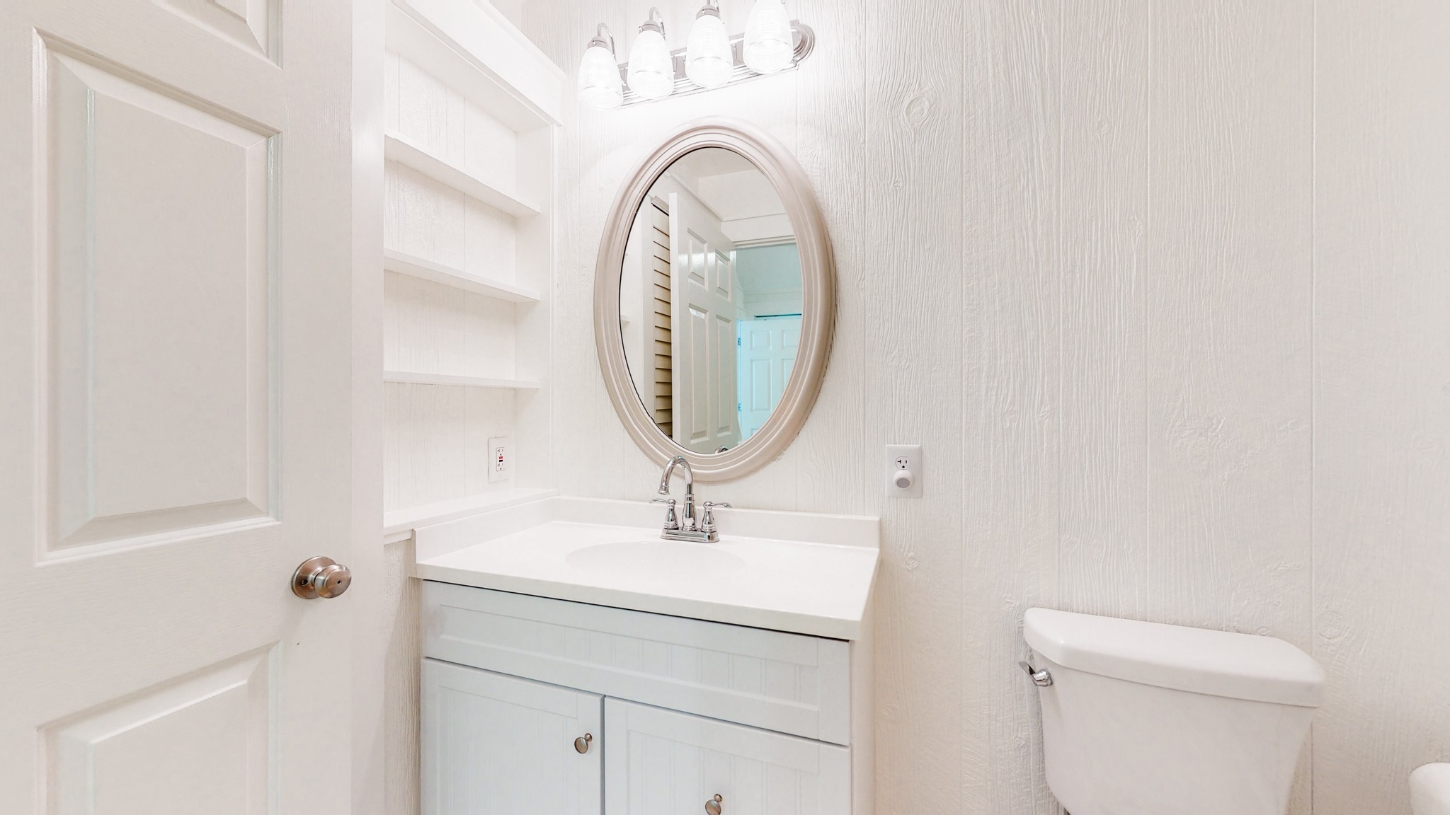 836 Pebble Cove Road Lebanon, TN 37087 - Photo 13 of 31 a bathroom with a sink and a mirror