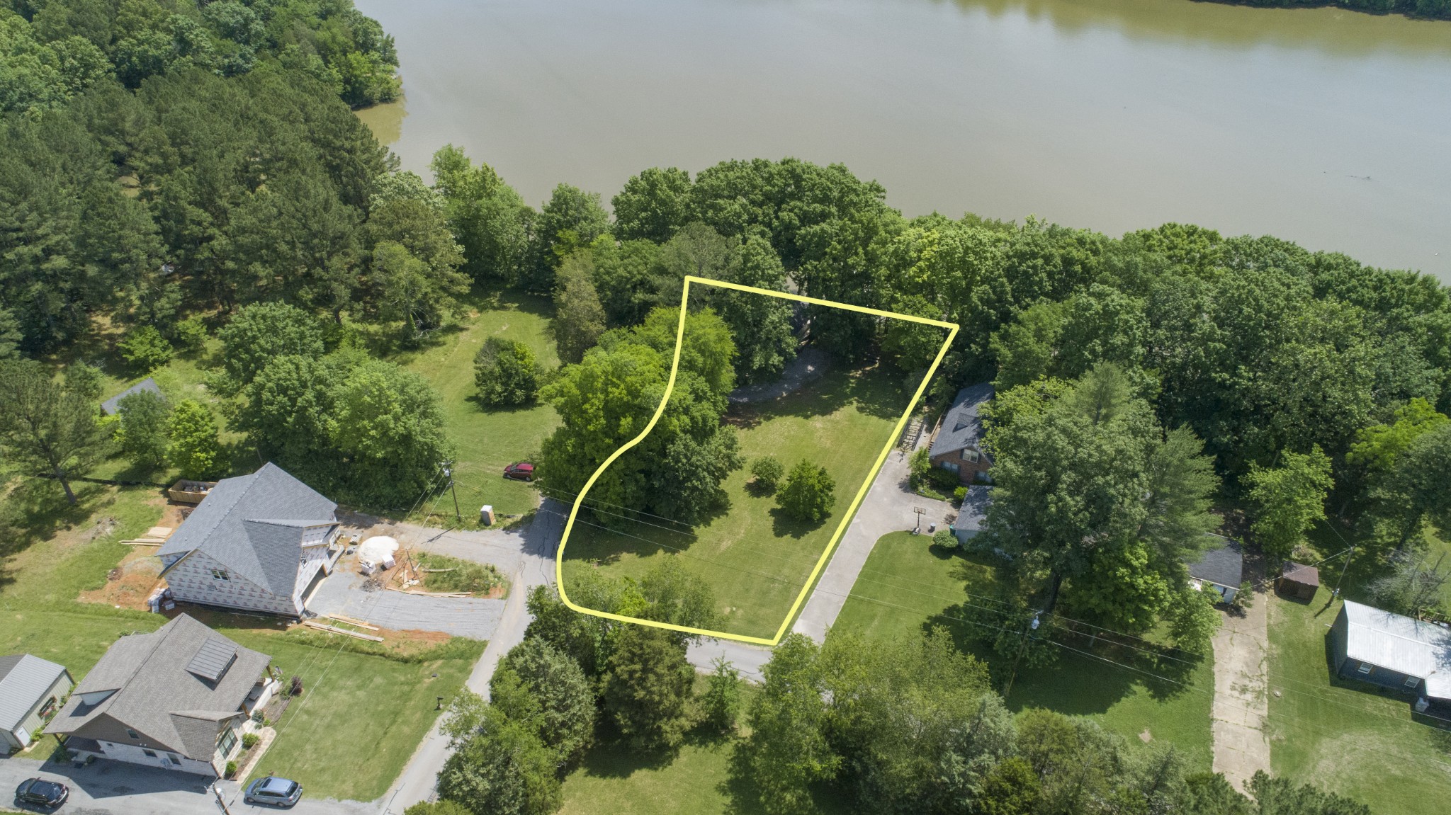 836 Pebble Cove Road Lebanon, TN 37087 - Photo 17 of 31 an aerial view of a house with a yard and lake view