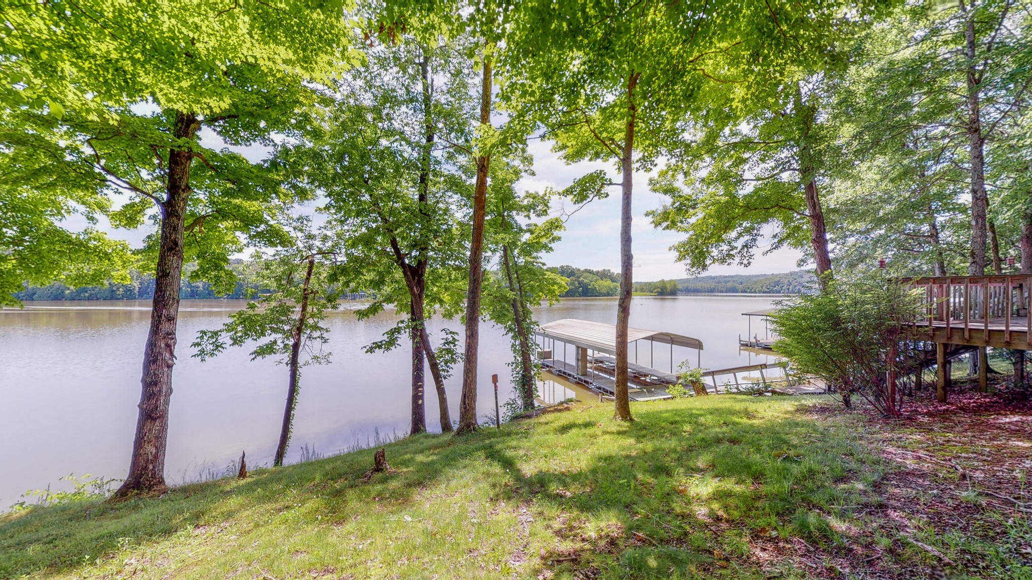 836 Pebble Cove Road Lebanon, TN 37087 - Photo 19 of 31 a view of a backyard with a bench