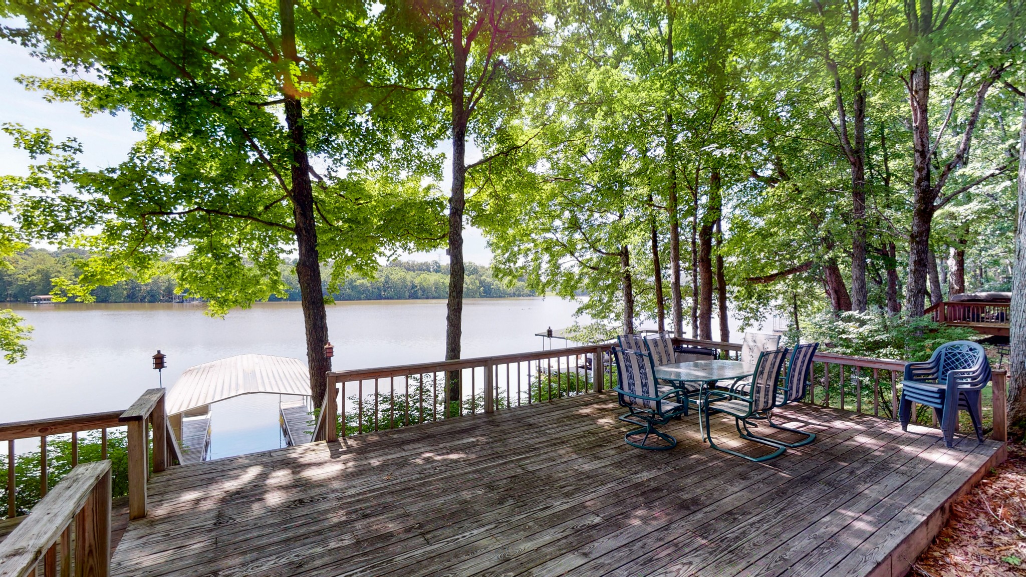 836 Pebble Cove Road Lebanon, TN 37087 - Photo 20 of 31 a view of a deck with chairs a barbeque with wooden fence and floor