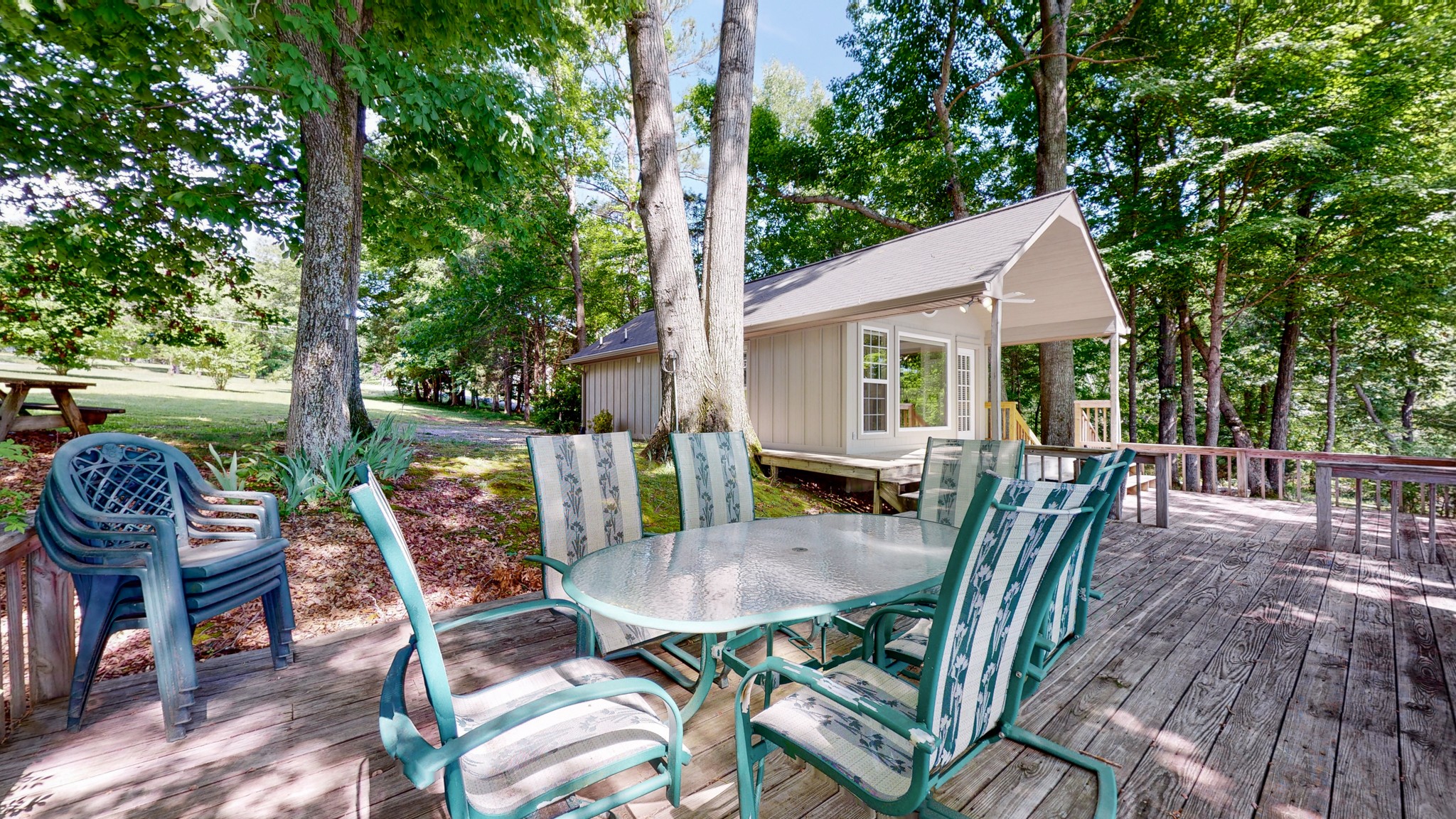 836 Pebble Cove Road Lebanon, TN 37087 - Photo 24 of 31 a view of a patio with a table chairs and backyard