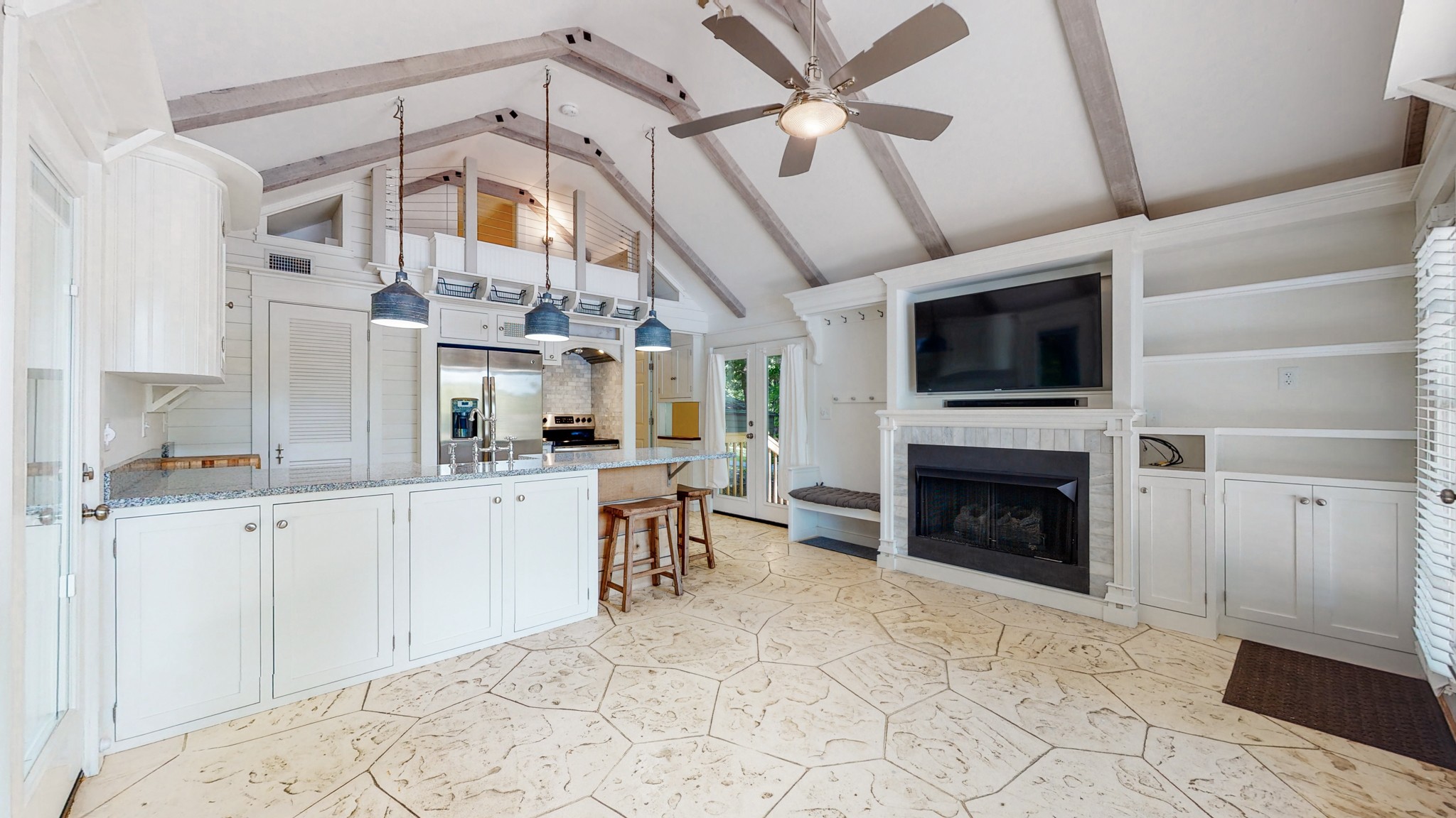836 Pebble Cove Road Lebanon, TN 37087 - Photo 5 of 31 a kitchen with furniture a fireplace and a ceiling fan