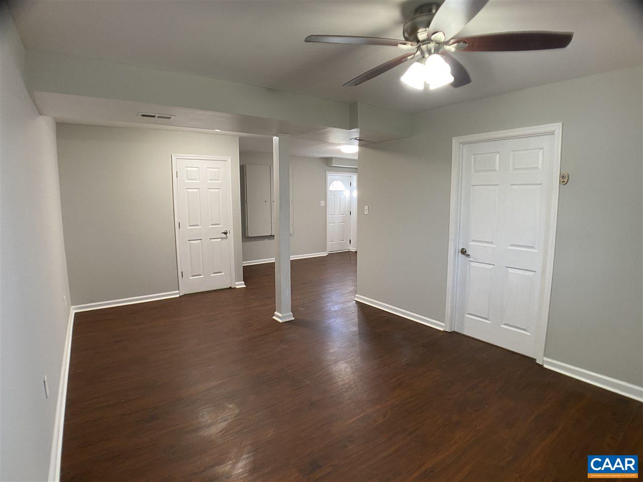 147 Buckboard Road Waynesboro, VA 22980 - Photo 17 of 25 a view of an empty room with wooden floor