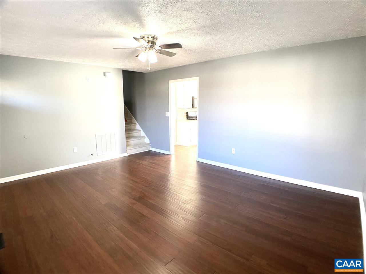 147 Buckboard Road Waynesboro, VA 22980 - Photo 3 of 25 a view of an empty room with wooden floor