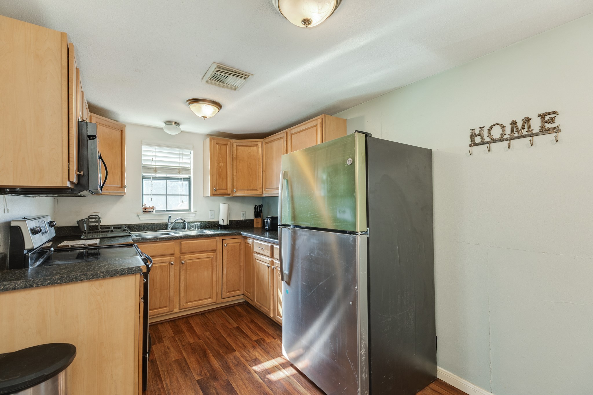 640 Whitten Street Clute, TX 77531 - Photo 25 of 34 Kitchen features tons of cabinets!